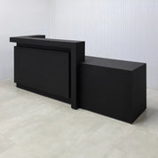 108-inch New York L ADA Reception Desk with Black Cinder Matte laminate desk, Black Cinder matte laminate workspace, Black Cinder matte laminate front panel, and Warm White LED with remote control.