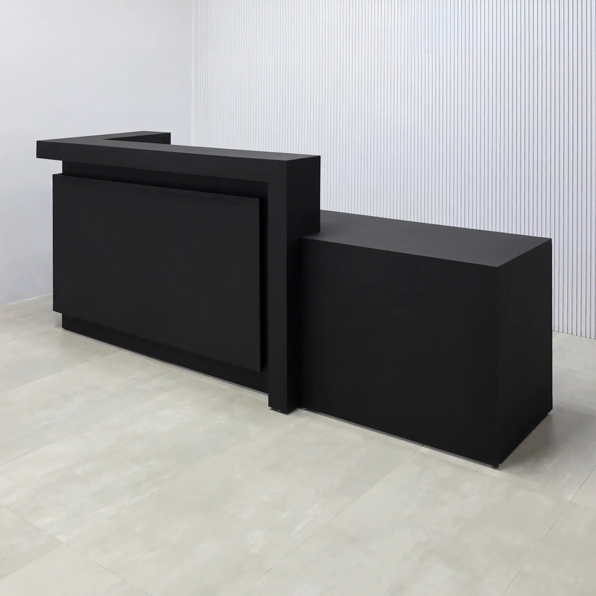 108-inch New York L ADA Reception Desk with Black Cinder Matte laminate desk, Black Cinder matte laminate workspace, Black Cinder matte laminate front panel, and Warm White LED with remote control.