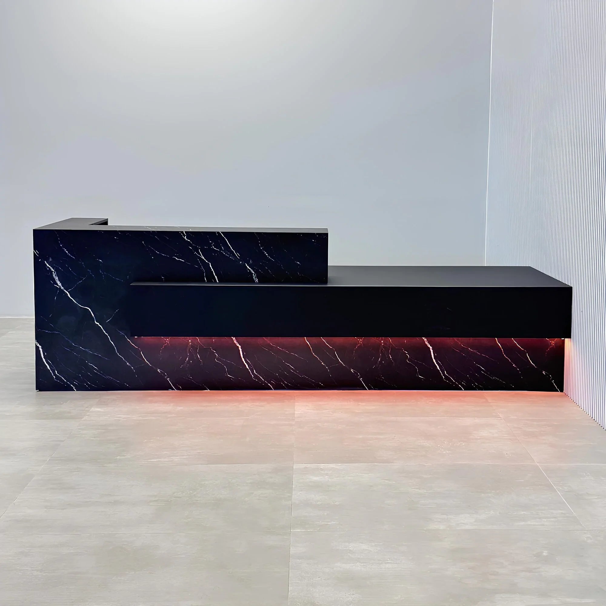 132-inch Atlanta Custom ADA Reception Desk with black stone palazzo desk, black traceless laminate workspace & accent panel, and colored LED.