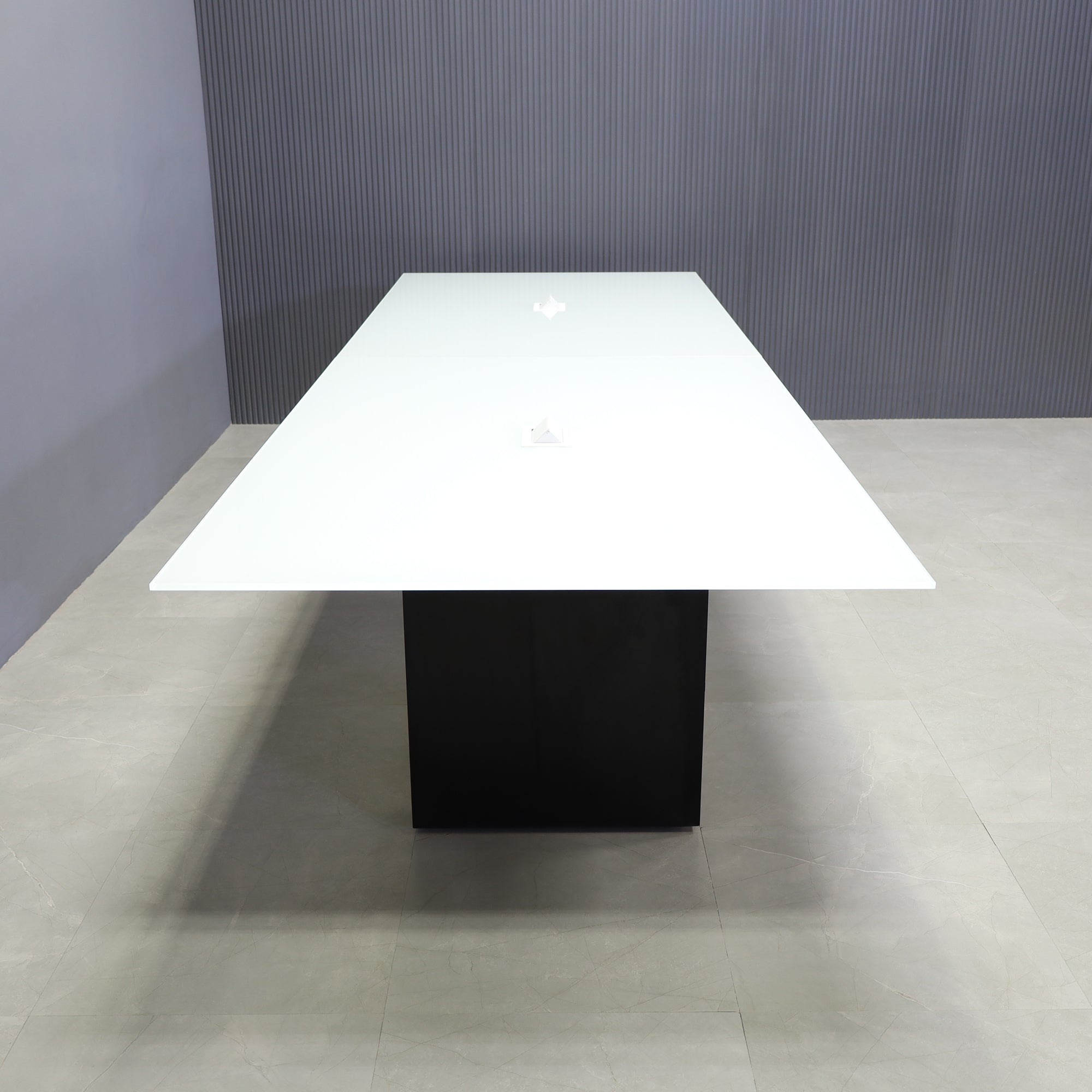 144-inch Omaha Rectangular Conference Table with white glass top, black matte laminate base, and 2 MX2 power boxes in white.