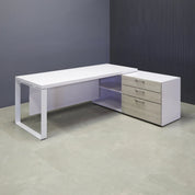 Aspen Executive Desk With Credenza in white gloss laminate top & credenza, greywood matte laminate privacy panel & front drawers, and white metal leg shown here.