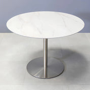 42-inch California Round Conference Table with 1/2-inch calcutta blanc engineered surface top and silver metal powder-coated base.