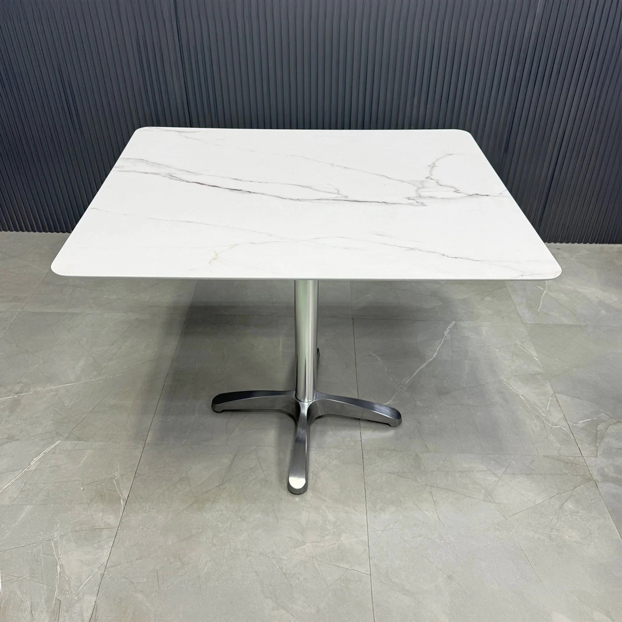 34-inch California Rectangular Cafeteria Table in 1/2-inch solenne marble engineered surface top and aluminum frame base.