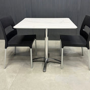 34-inch California Rectangular Cafeteria Table in 1/2-inch solenne marble engineered surface top and aluminum frame base.