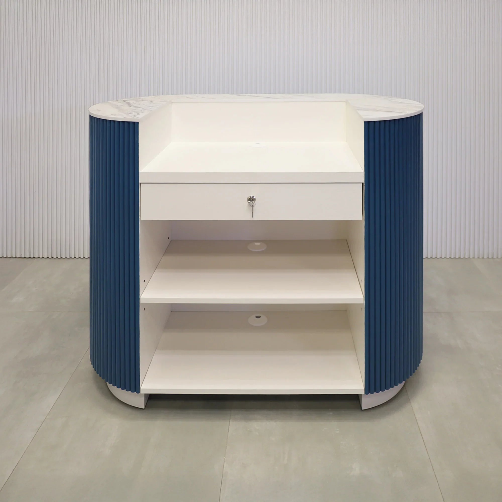 48-inch The Pill Podium Desk with Dover Off-White matte laminate workspace, hand-painted Sapphire CSP-690 Benjamin Moore solid wood tambour accent, and Dover Off-White matte laminate toe-kick.