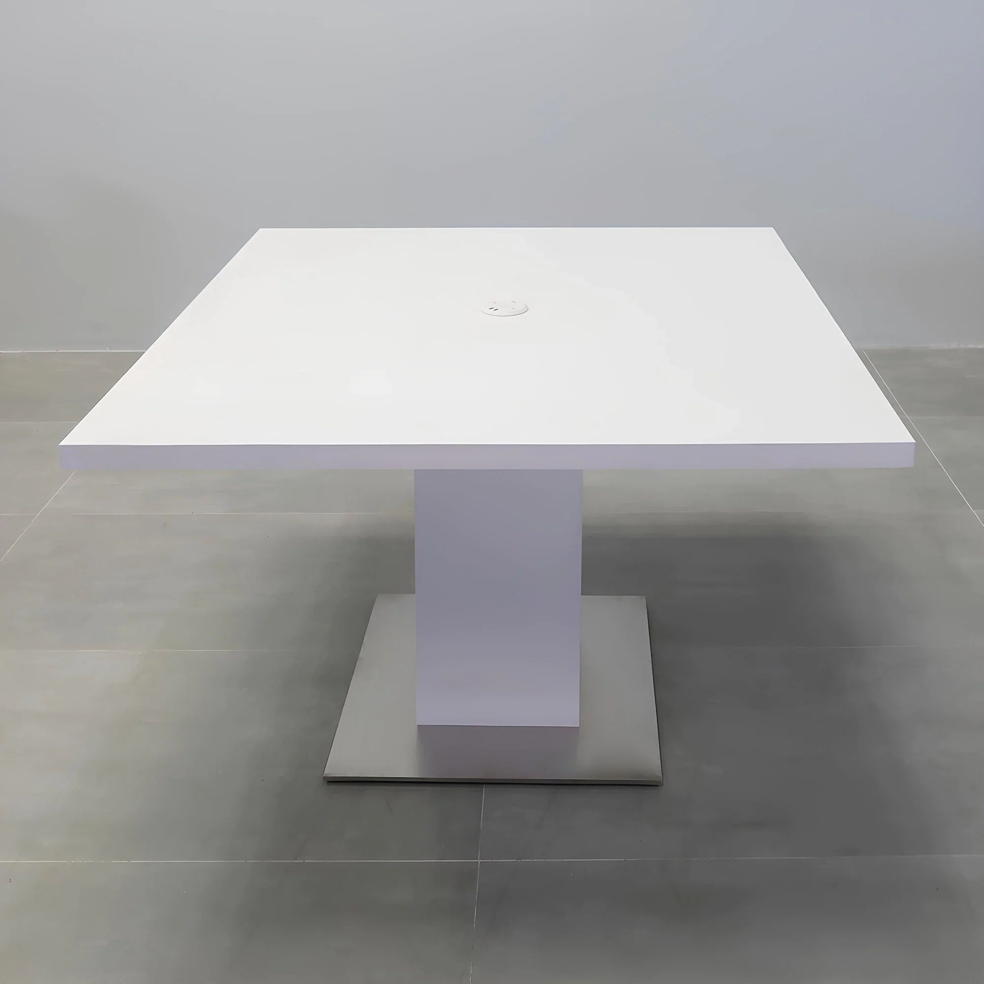 54-inch Newton Square Table with X1 Base, pedestal in white matte PVC, silver metal powder-coated base, and white MX1 power box.