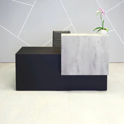 72-inch Los Angeles Custom Reception Desk with the counter on the right side when facing front in metropolitan concrete PVC, and black traceless laminate desk, shown here.