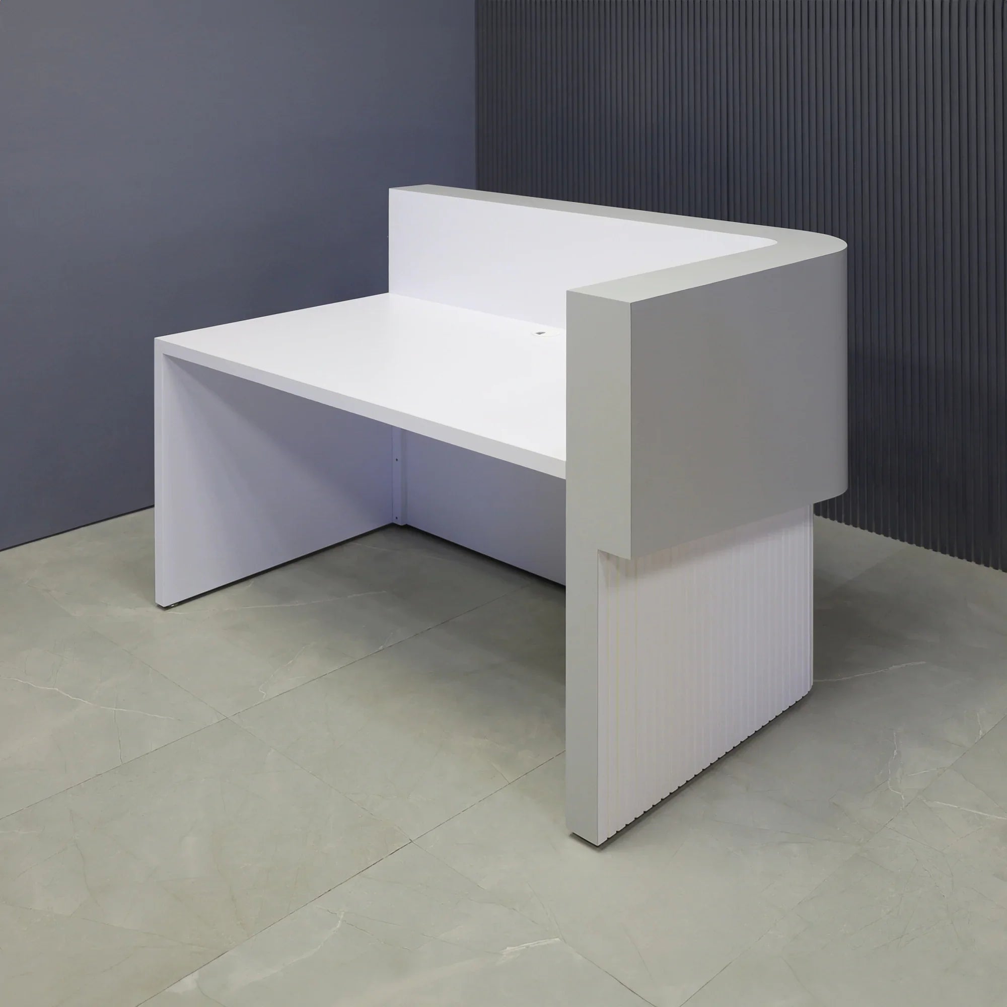 60-inch Nola L-Shape Curved Custom Reception Desk in folkstone gray matte laminate counter, white matte tambour front desk and white matte laminate workspace, with white LED, shown here.