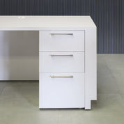 60-inch Houston Retail Custom Reception Desk in white gloss laminate main desk and brushed aluminum toe-kick. Built-in storage on the right side when sitting.
