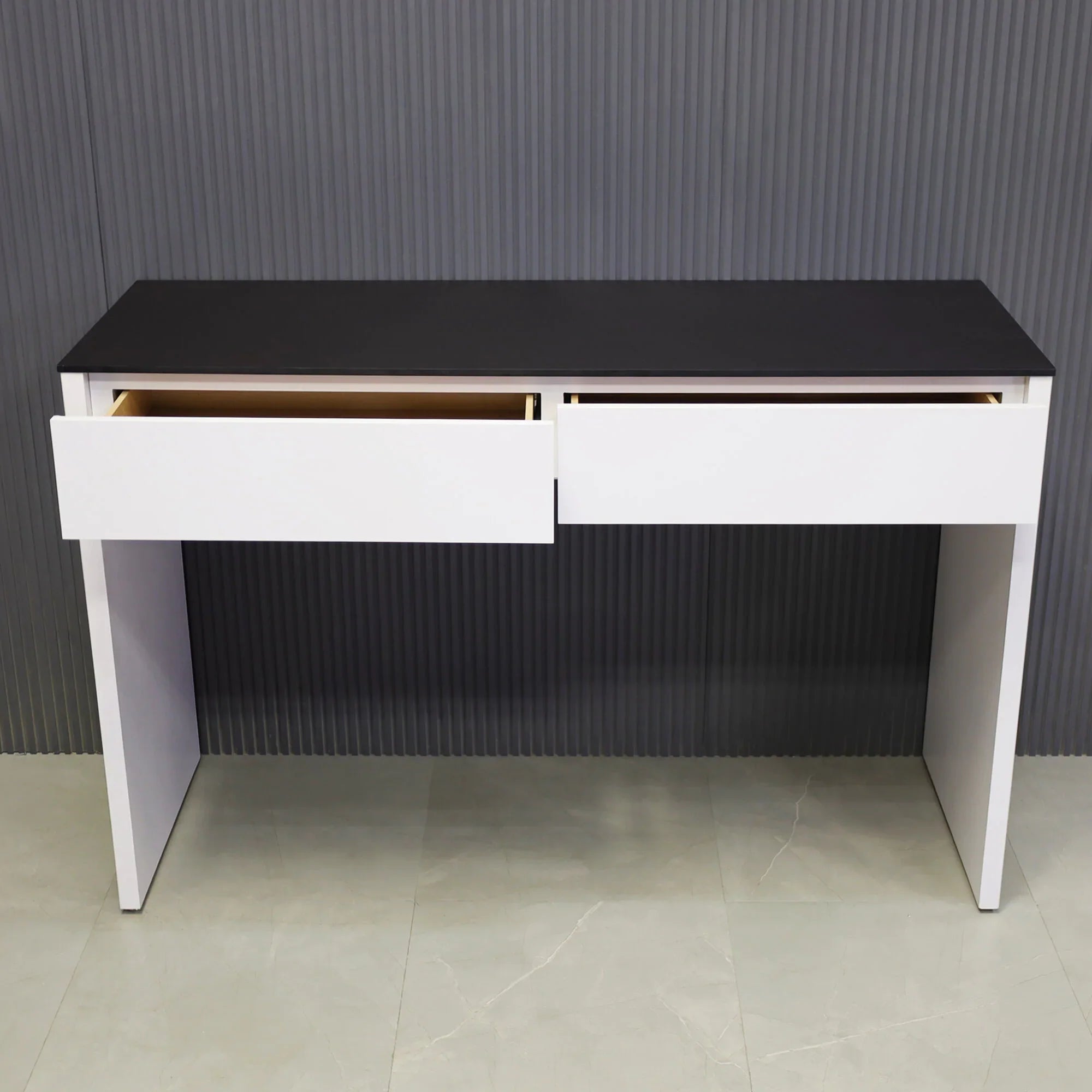 66-inch Ashville Bar Table in 1/2" Black traceless engineered surface top and white matte laminate base with two drawers, shown here.