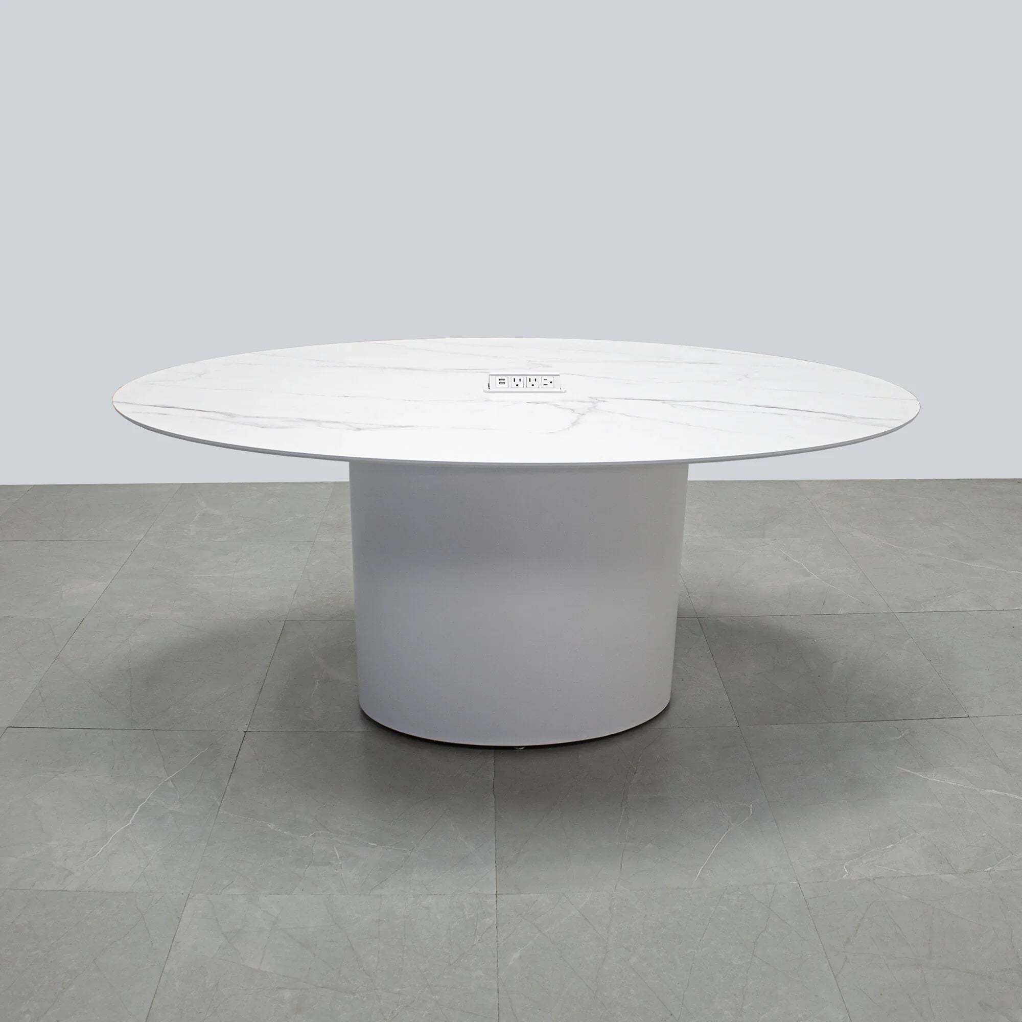 72-inch Aurora Oval Conference Table in 1/2-inch solenne marble engineered surface top, white matte laminate base, and white power box.