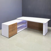 72-inch Avenue Curved Executive Desk with credenza on the left side when sitting, with 1/2" white solid engineered surface top, uptown walnut custom front panels and privacy panel, and white gloss laminate base and credenza, shown here.