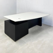 Avenue Straight Executive Desk with light gray traceless engineered surface top, black traceless laminate base & cabinet, and black traceless laminate privacy panel.