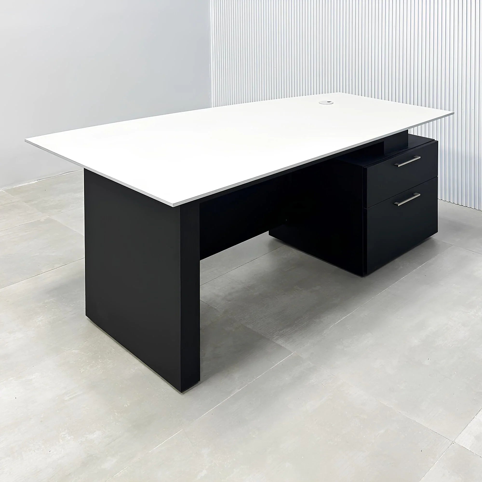 Avenue Straight Executive Desk with light gray traceless engineered surface top, black traceless laminate base & cabinet, and black traceless laminate privacy panel.