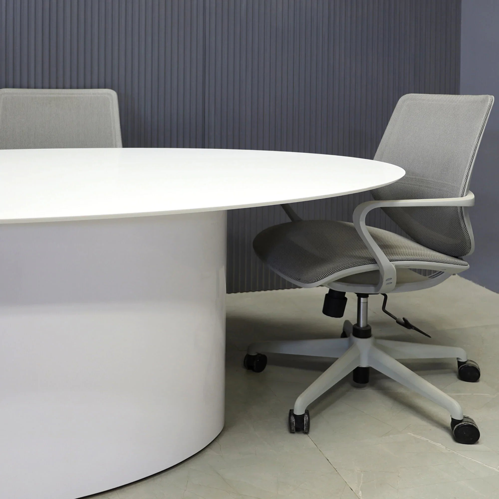 84-inch Aurora Oval Conference Table in 1/2-inch white solid engineered surface top, and white gloss laminate base.