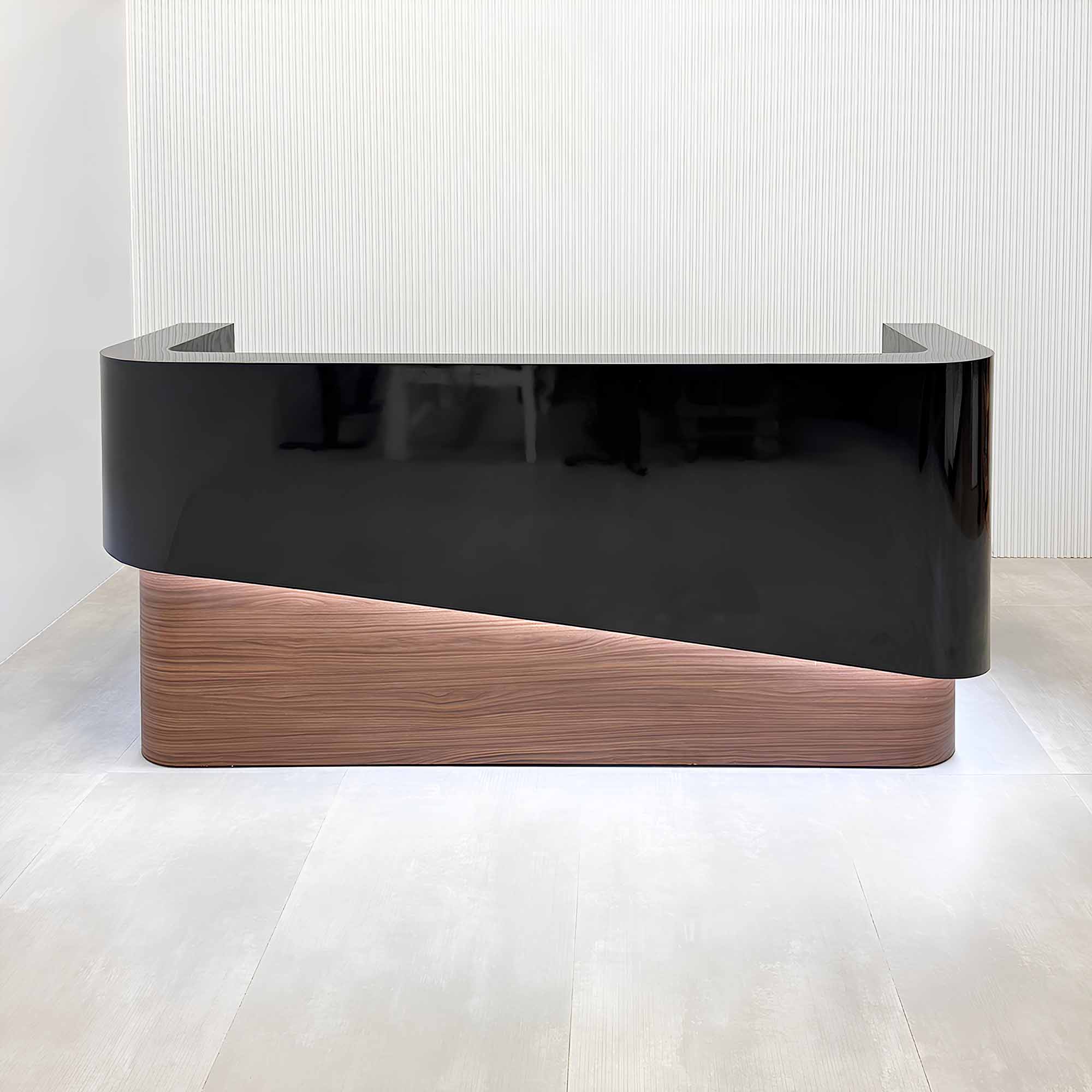 90-inch Nola Curved Custom Reception Desk with black gloss laminate counter & storage, walnut heights matte laminate bottom, black gloss laminate workspace, and white warm LED.