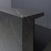 90-inch Los Angeles Custom Reception Desk with the counter on the right side when facing front in black stone PVC, and black traceless laminate desk, with white LED, shown here.