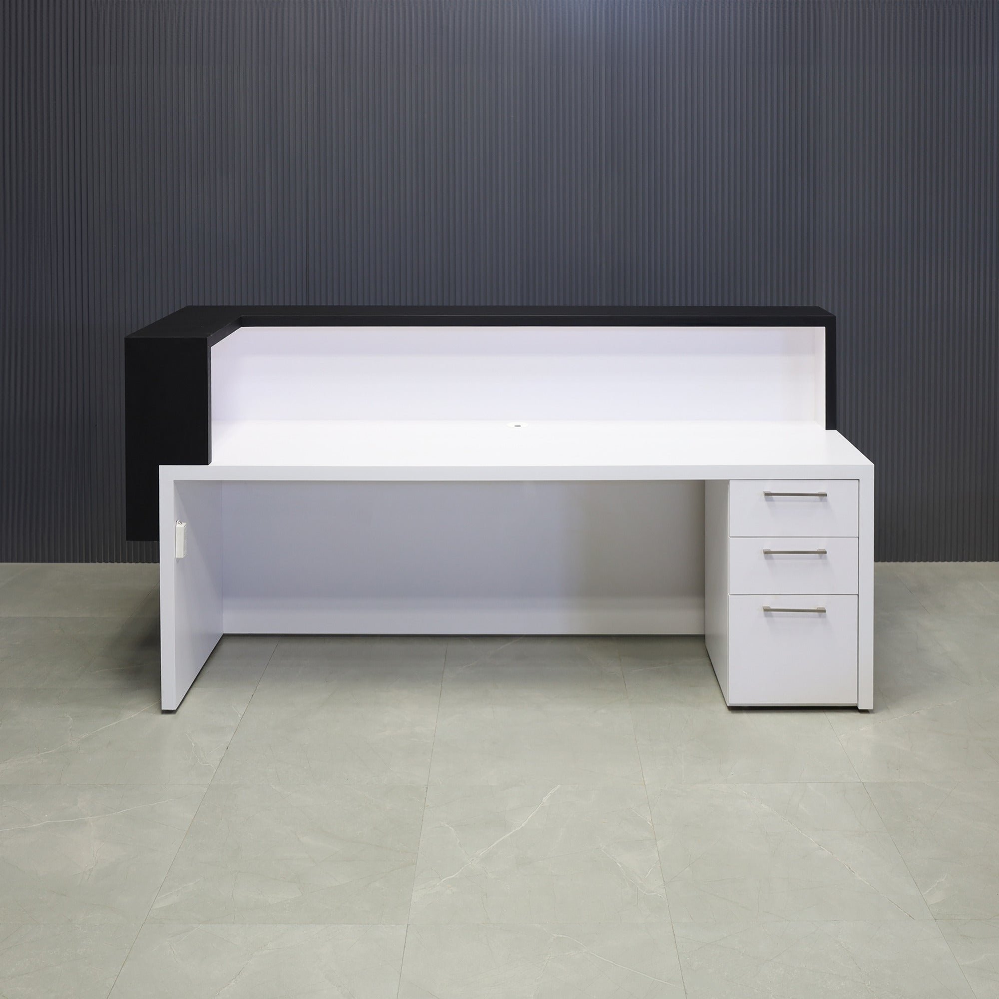 90-inch San Francisco L-Shape Reception Desk, right l-panel side when facing front in black matte laminate counter and white matte laminate desk, with white LED, and built-in storage on right side when sitting, shown here.