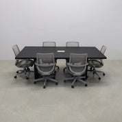 92 inches Newton Rectangular Conference Table in Black Traceless Laminate top and Black Matte Laminate base finish. Ellora power box, and six gray chairs shown here.