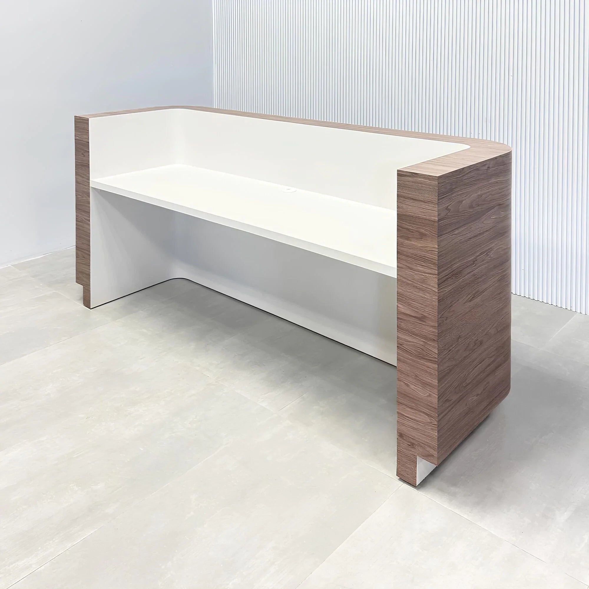 90-inch Nola Custom Reception Desk with hazel walnut matte laminate main desk, dover off-white workspace, dover off-white toe-kick, and warm white LED.
