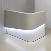60-inch Nola L-Shape Curved Custom Reception Desk in folkstone gray matte laminate counter, white matte tambour front desk and white matte laminate workspace, with white LED, shown here.