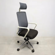 Terra Office Chair with Fixed Arms in light gray mesh back and black fabric seat cushion, shown here.