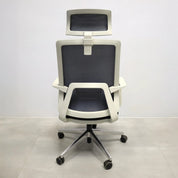 Terra Office Chair with Fixed Arms in light gray mesh back and black fabric seat cushion, shown here.