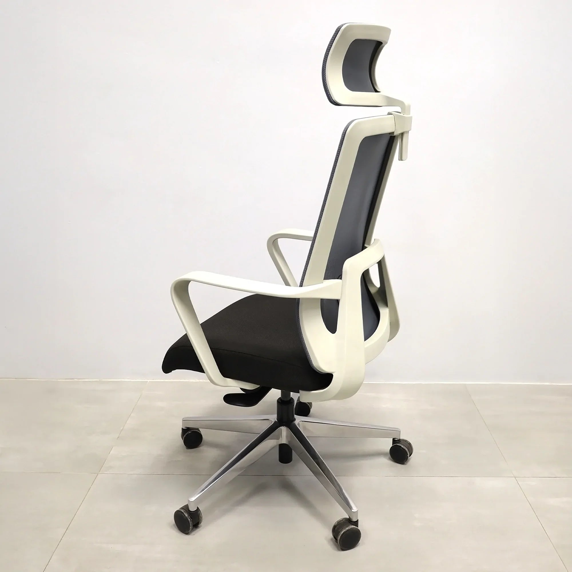 Terra Office Chair with Fixed Arms in light gray mesh back and black fabric seat cushion, shown here.