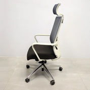 Terra Office Chair with Fixed Arms in light gray mesh back and black fabric seat cushion, shown here.