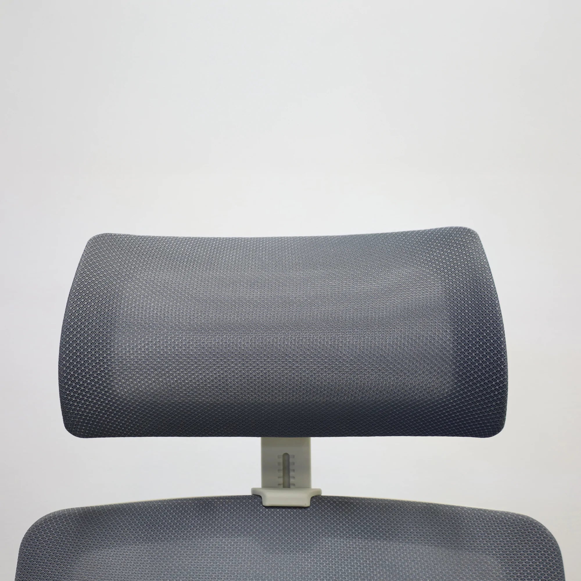 Terra Office Chair with Fixed Arms in light gray mesh back and black fabric seat cushion, shown here.